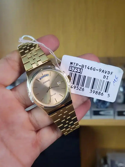 Casio mtp b146 gold daydate