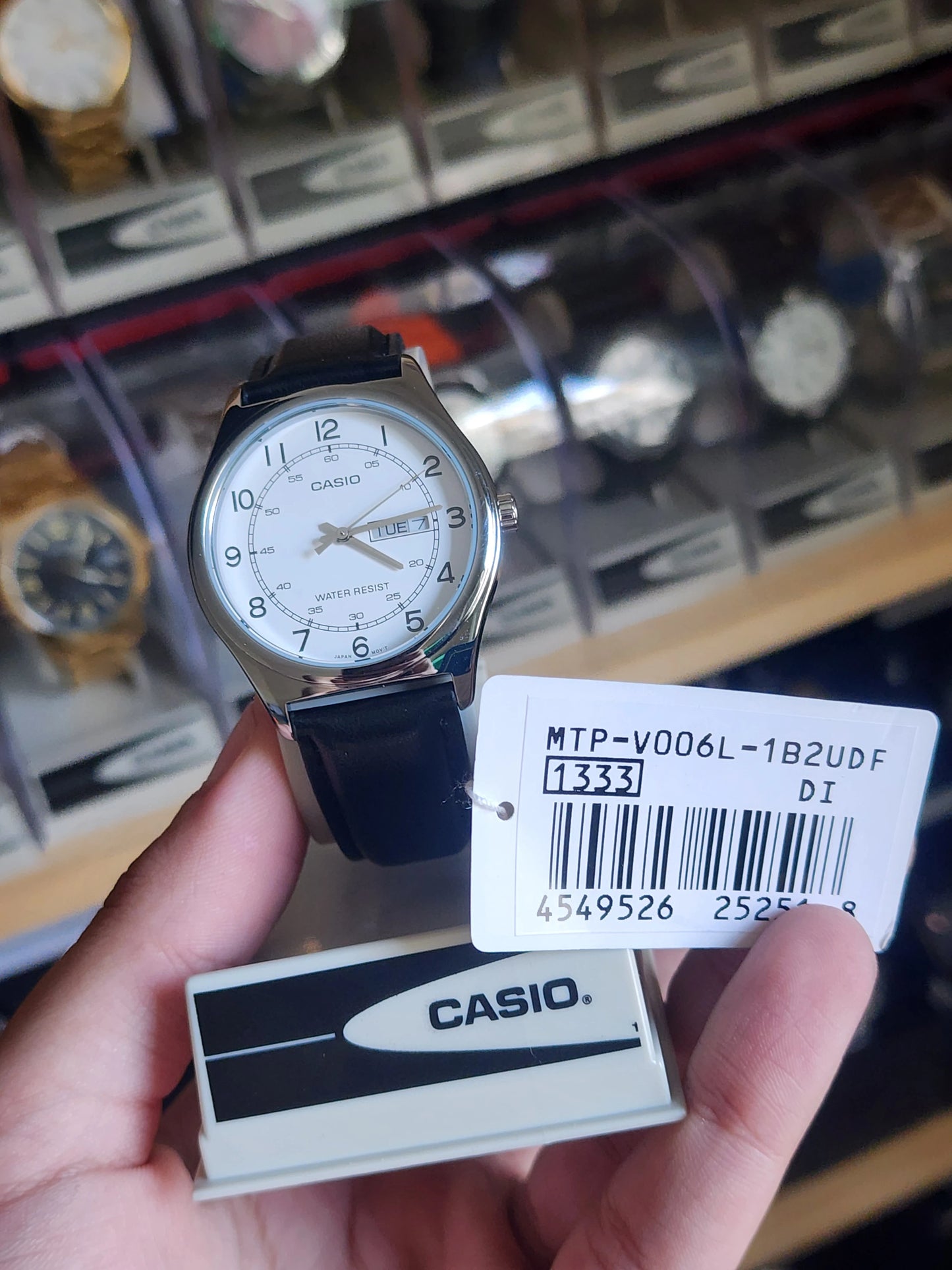 Casio leather mtp v006l white dial