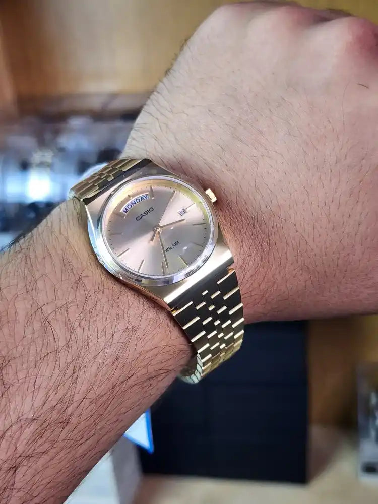 Casio mtp b146 gold daydate
