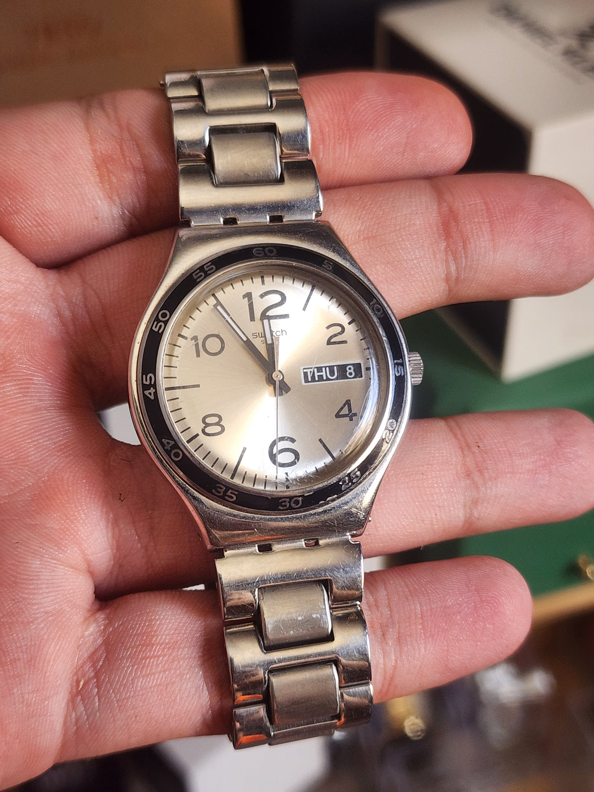 Swatch beige dial black circle