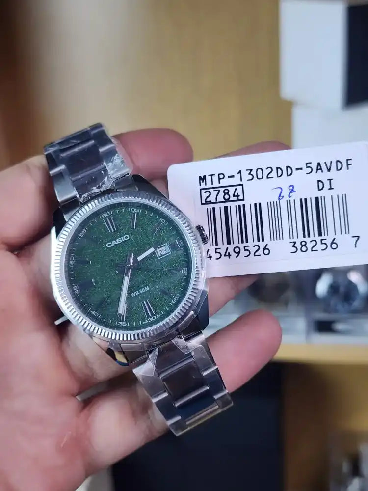 Casio mtp 1302 green rain