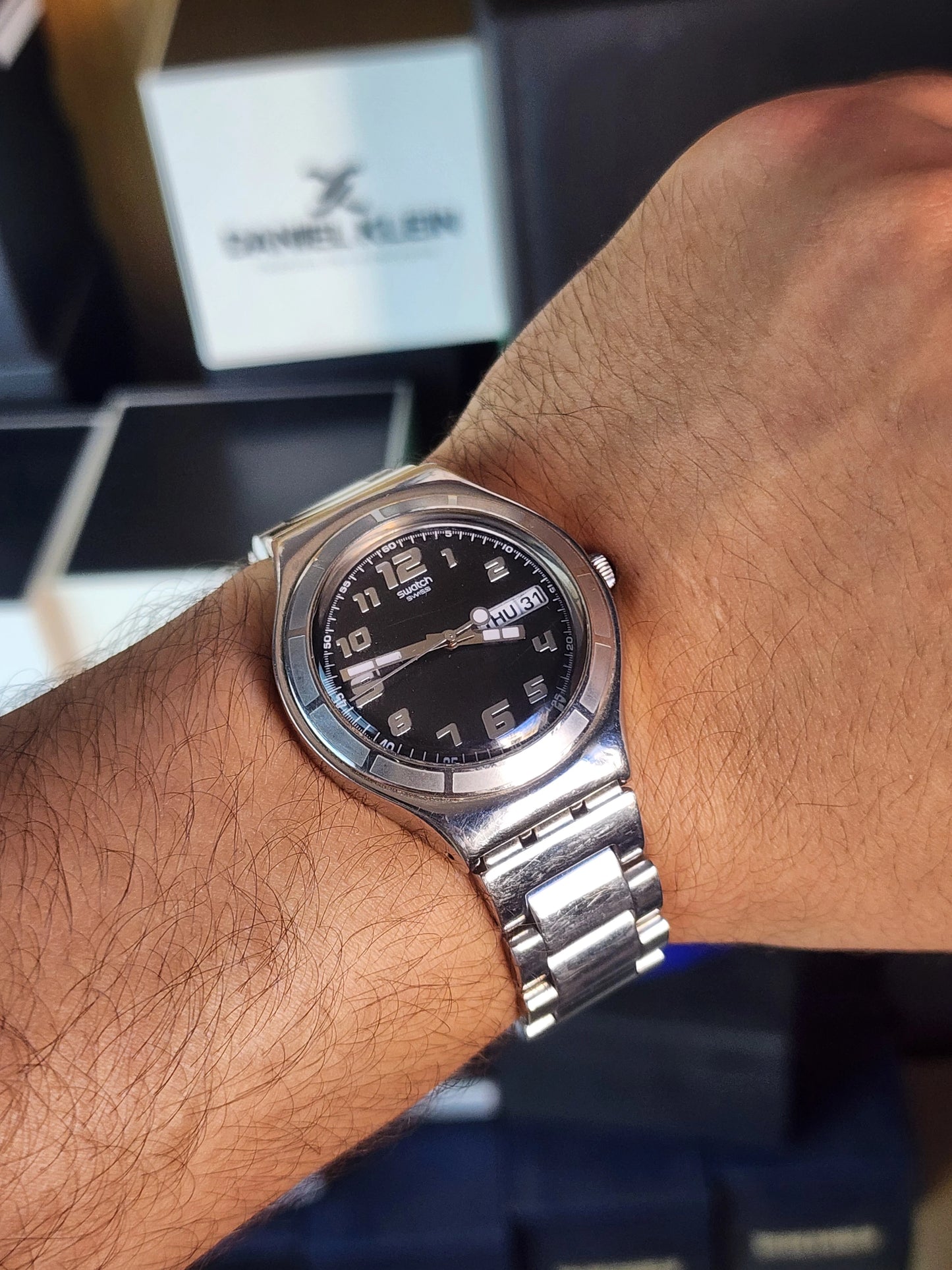 Swatch black dial daydate