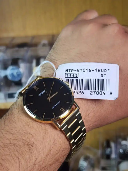 Casio mtp VT01 gold black dial