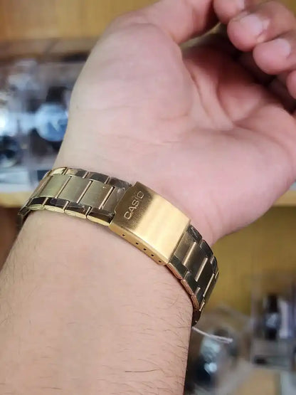 Casio mtp VT01 gold black dial
