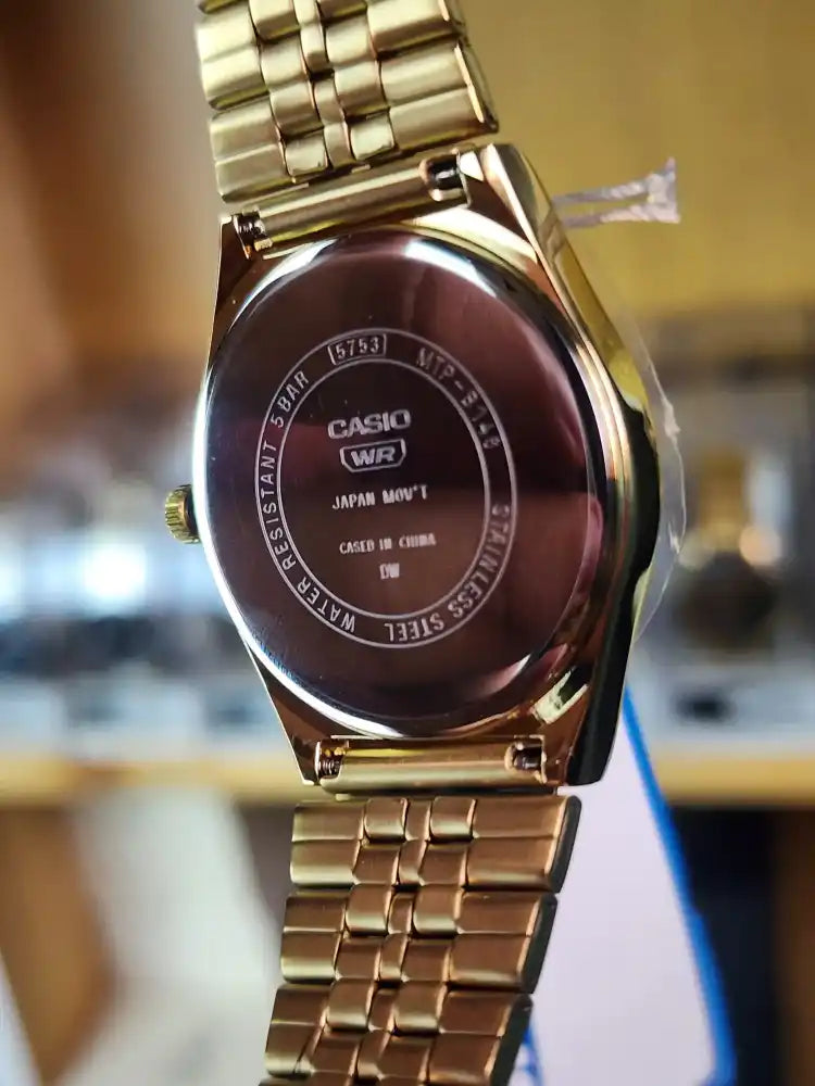 Casio mtp b146 gold daydate